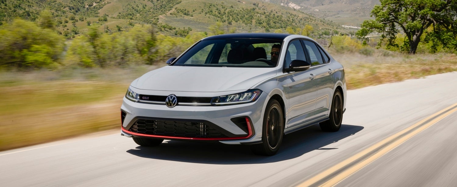 2026 Volkswagen Jetta GLI driving in the country side