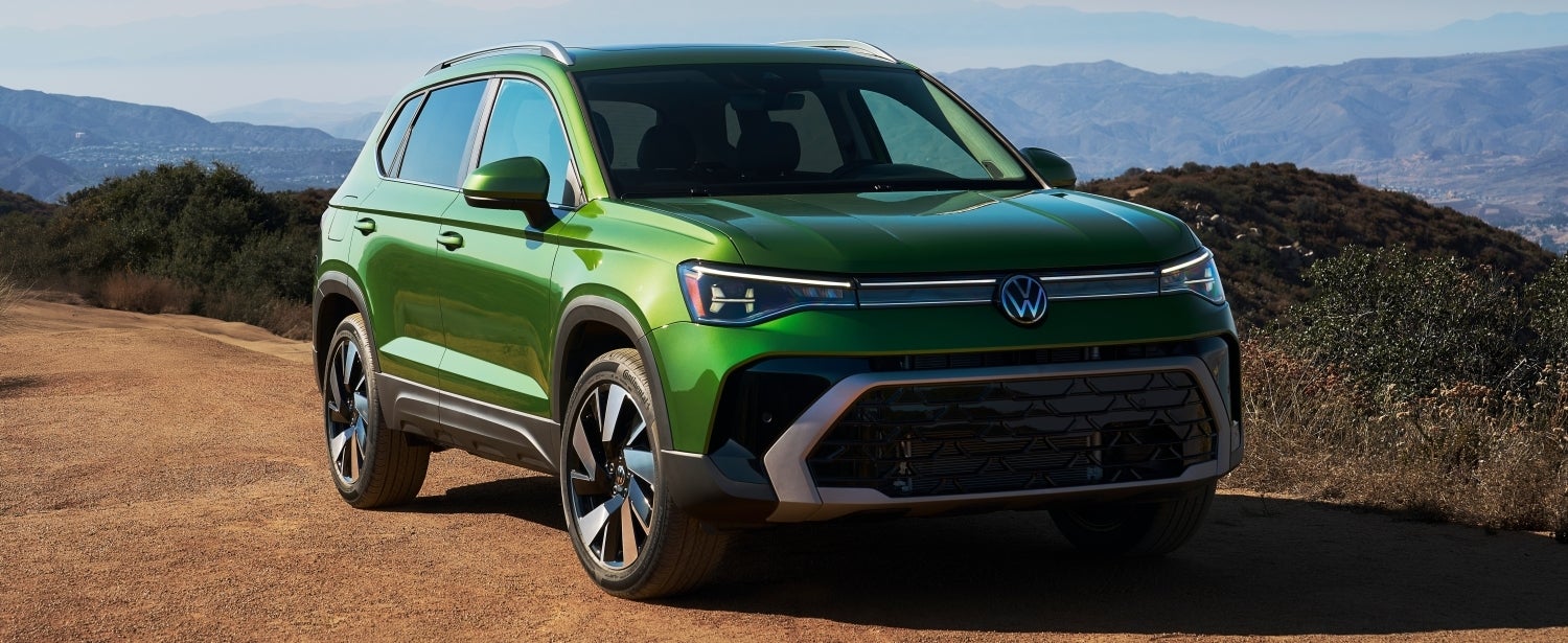 2026 Volkswagen Taos parked in the mountains